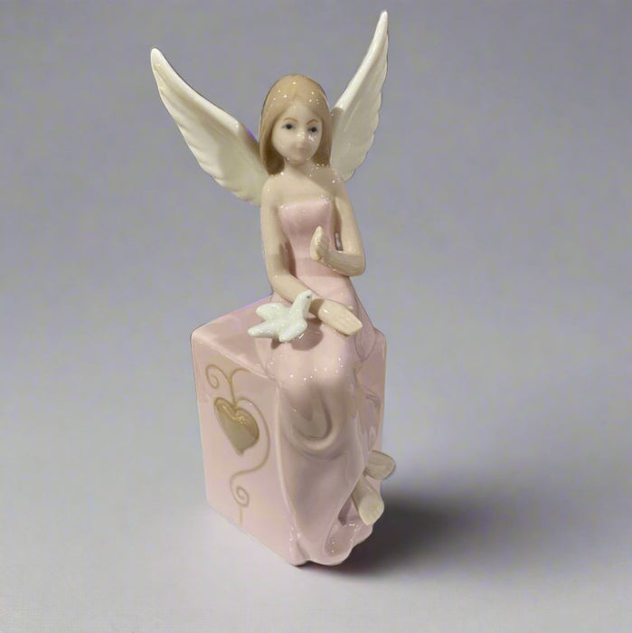 Soft Pink Sitting Elegant Angel