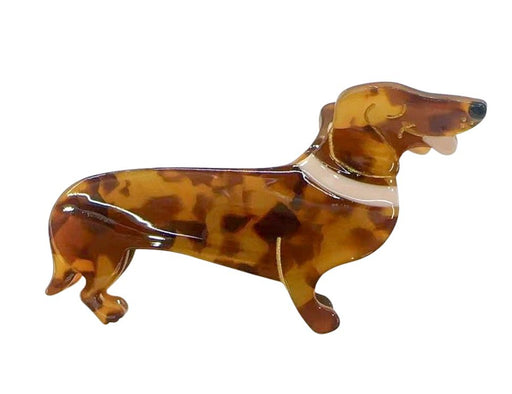 Tortoiseshell cat-shaped hair clip on a white background