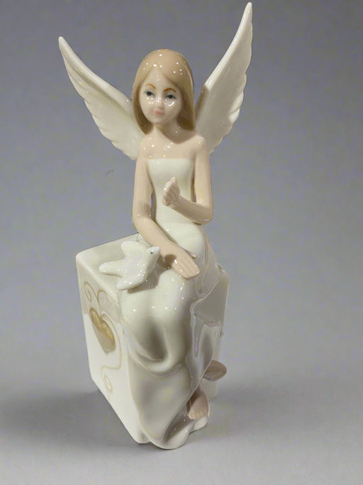 Cream Sitting Elegant Angel 